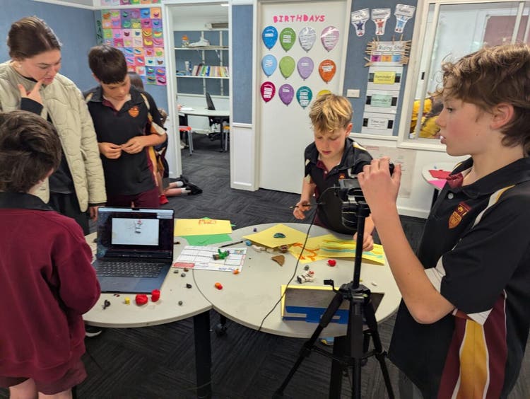 Students and staff with Digi Ed equipment