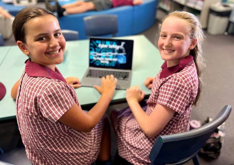 2 students with computer